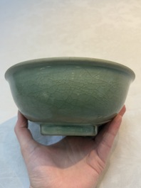 A Chinese Longquan celadon bowl with floral anhua design, Ming