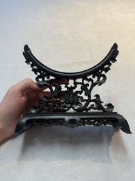 A pair of Chinese carved jade &lsquo;elephant&rsquo; plaques on wooden stands, 19th C.