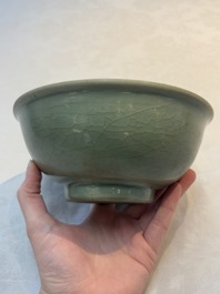 A Chinese Longquan celadon bowl with floral anhua design, Ming
