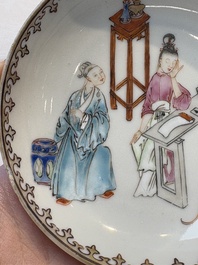 A Chinese iron-red-decorated 'boy and buffalo' cup and saucer and a famille rose 'Xi Xiang Ji' cup and saucer, Qianlong