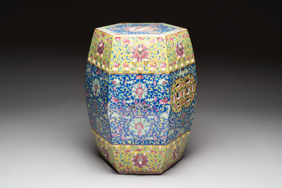 A Chinese famille rose blue and yellow-ground hexagonal garden seat, 19th C.