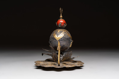 An Ottoman gilt-bronze inscribed incense burner with a red stone, 19th C.