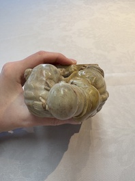 A Chinese soapstone carving of a boy riding an elephant, 20th C.