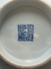 A Chinese blue, white and copper-red conical bowl, Qianlong mark and of the period
