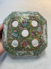 A pair of Chinese Canton famille rose flower holders and covers with figural design, 19th C.