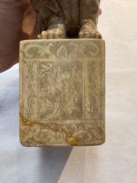 A Chinese soapstone carving of a boy riding an elephant, 20th C.