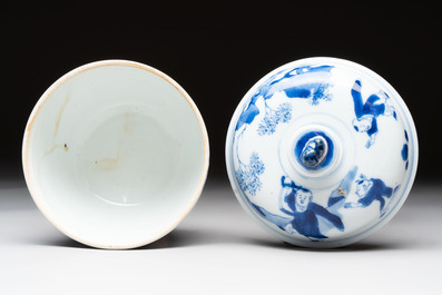 A Chinese blue and white 'figures in a landscape' bowl and cover, Kangxi mark and of the period