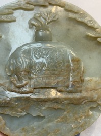 A pair of Chinese carved jade &lsquo;elephant&rsquo; plaques on wooden stands, 19th C.