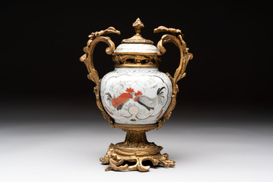 A Chinese famille verte covered bowl, a Dutch-decorated bowl, a gilt-bronze mounted pot-pourri vase and an Imari-style covered jug, Kangxi/Qianlong