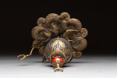 An Ottoman gilt-bronze inscribed incense burner with a red stone, 19th C.