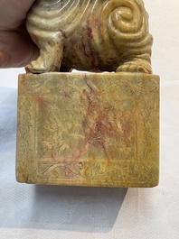 A Chinese soapstone carving of a boy riding an elephant, 20th C.