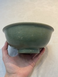 A Chinese Longquan celadon bowl with floral anhua design, Ming