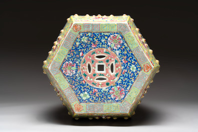 A Chinese famille rose blue and yellow-ground hexagonal garden seat, 19th C.