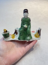 A Chinese verte biscuit 'scholar' brush rest, Kangxi