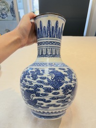 A Chinese blue and white copper-mounted 'cranes among clouds' vase, 18th C.