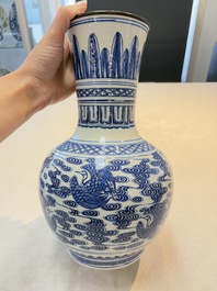 A Chinese blue and white copper-mounted 'cranes among clouds' vase, 18th C.