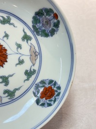 A Chinese doucai plate with stylised floral design, Chenghua mark, Kangxi/Yongzheng