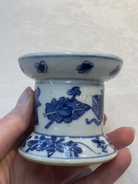 A pair of rare Chinese blue and white sanders with antiquities and floral design, Kangxi