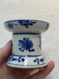 A pair of rare Chinese blue and white sanders with antiquities and floral design, Kangxi