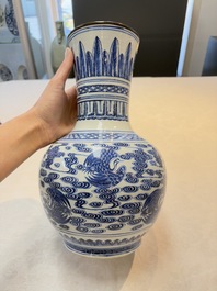A Chinese blue and white copper-mounted 'cranes among clouds' vase, 18th C.