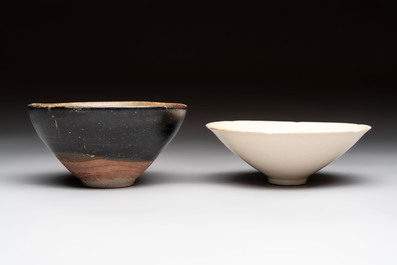 A Chinese Jizhou papercut resist-decorated 'plum blossom' bowl and a white-glazed bowl, Southern Song/Ming