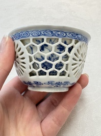 A Chinese blue and white reticulated double-walled cup, ruyi mark, Kangxi