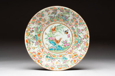 A Chinese wucai covered box, a blue and white ewer, a famille rose covered box and a plate, Wanli, Kangxi and Guangxu mark, 19/20th C.