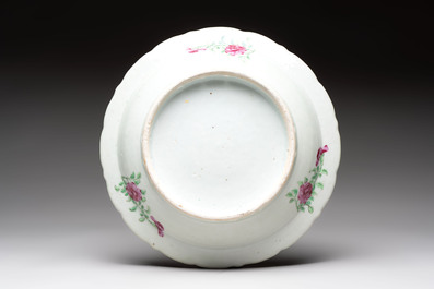 Four Chinese Canton famille rose plates and a covered double-teapot, 19th C.