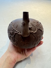 A Chinese Yixing stoneware 'squirrels among grape vines' teapot and cover, Kangxi