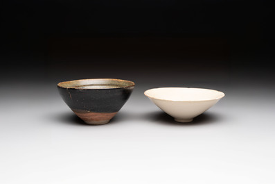 A Chinese Jizhou papercut resist-decorated 'plum blossom' bowl and a white-glazed bowl, Southern Song/Ming