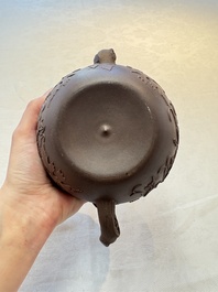 A Chinese Yixing stoneware 'squirrels among grape vines' teapot and cover, Kangxi