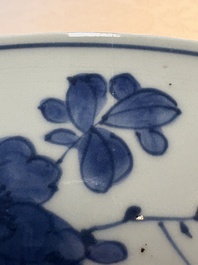 A Chinese blue and white 'floral' dish and a wucai 'floral' dish, Shunzhi/ Kangxi