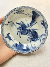 A Chinese blue and white 'Mongolian hunting' cup and saucer, jade mark, Kangxi