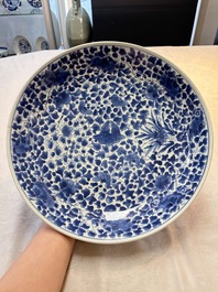 A Chinese blue and white 'floral' dish and a wucai 'floral' dish, Shunzhi/ Kangxi