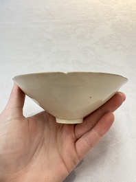 A Chinese Jizhou papercut resist-decorated 'plum blossom' bowl and a white-glazed bowl, Southern Song/Ming