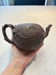 A Chinese Yixing stoneware 'squirrels among grape vines' teapot and cover, Kangxi