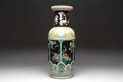 A fine Chinese famille noire 'antiquities' vase, 19th C.