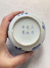 A Chinese blue and white 'figures in a landscape' bowl and cover, Kangxi mark and of the period