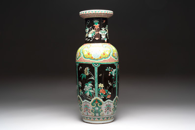 A fine Chinese famille noire 'antiquities' vase, 19th C.