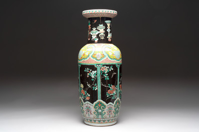 A fine Chinese famille noire 'antiquities' vase, 19th C.