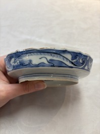 A Japanese blue and white 'rabbit' cup and a 'deer' plate, Edo, 17th C.