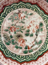 A Chinese blue and white 'floral' dish and a wucai 'floral' dish, Shunzhi/ Kangxi