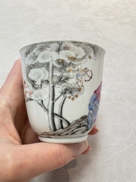 A Chinese famille rose 'erotic subject' cup and saucer, Yongzheng/Qianlong