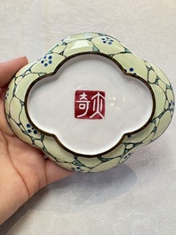 A pair of Chinese Canton enamel quadrifoil 'riverscape' saucers, Yi Qi 亦奇 mark, 18th C.