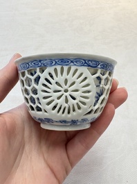 A Chinese blue and white reticulated double-walled cup, ruyi mark, Kangxi