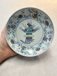 A Chinese doucai 'flower basket' plate, Chenghua mark, 18/19th C.