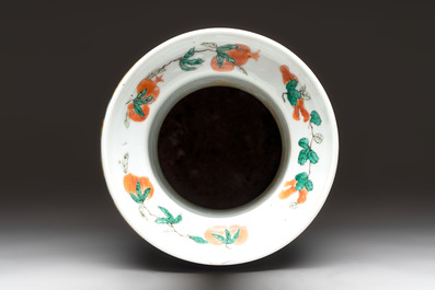 A fine Chinese famille noire 'antiquities' vase, 19th C.