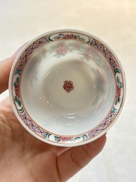 A set of six Chinese famille rose 'peonies' cups and saucers, Yongzheng/Qianlong