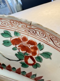 A Chinese blue and white 'floral' dish and a wucai 'floral' dish, Shunzhi/ Kangxi
