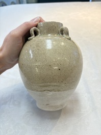A Chinese crackle-glazed vase and a cream-glazed kendi, Tang/Song